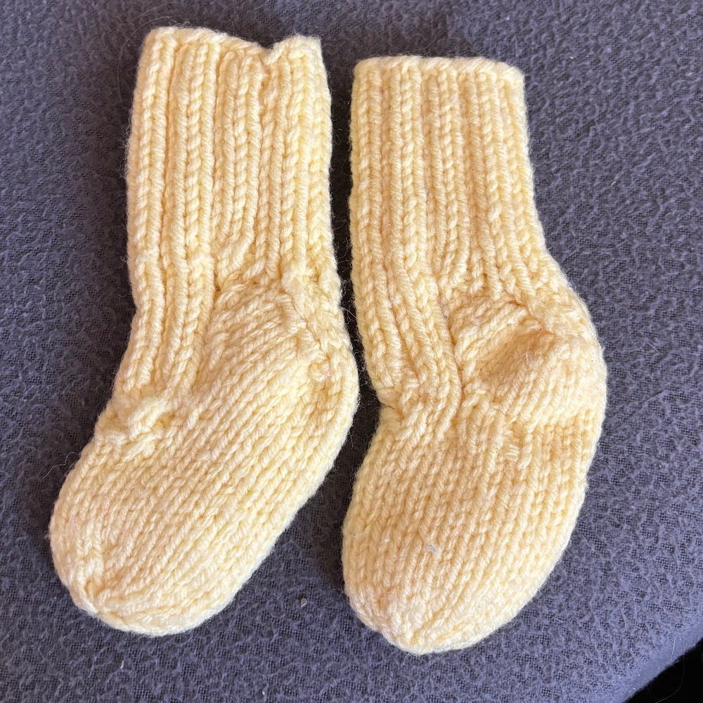 Handmade yellow baby socks